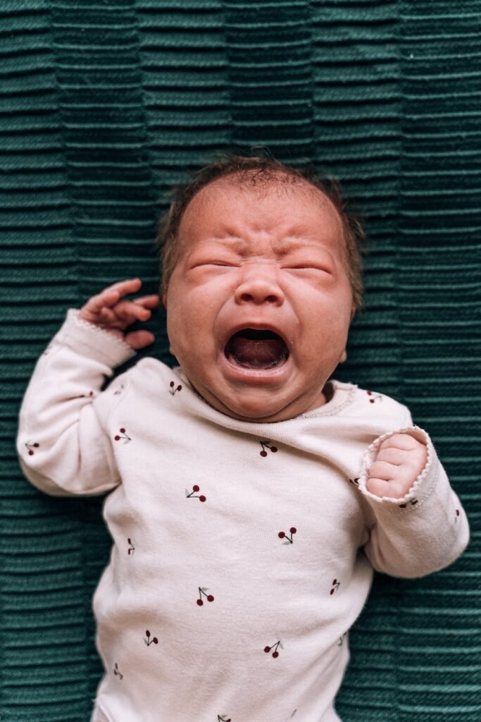 a newborn baby crying